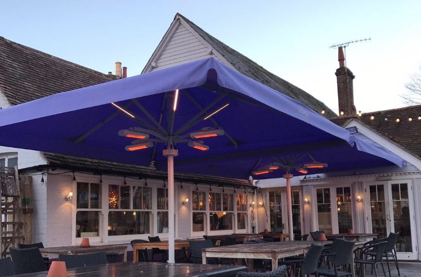 Purple umbrellas with heating and LED systems for pubs, taverns, coffee house