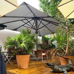 Large rectangular umbrella, parasol, with heat and light in South London Large rectangular umbrella in South London Coffee Shop on a portable base